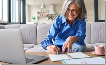 Mature senior woman is having e learning remote class.