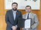 Rector de la UCSC y representante de Fundación Imagen de Chile durante la firma de convenio internacional