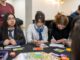 Estudiantes escolares participando en el torneo de finanzas personales FinanCity de la Universidad San Sebastián